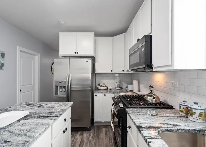 Newly Rehabbed Greystone With 2 Private Apartments, Backyard, Garage, Laundry, Close To Expressway *