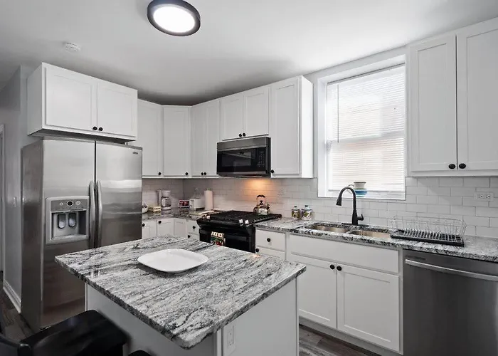 Newly Rehabbed Greystone With 2 Private Apartments, Backyard, Garage, Laundry, Close To Expressway