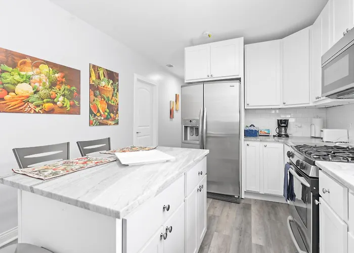 Newly Rehabbed Greystone With 2 Private Apartments, Backyard, Garage, Laundry, Close To Expressway